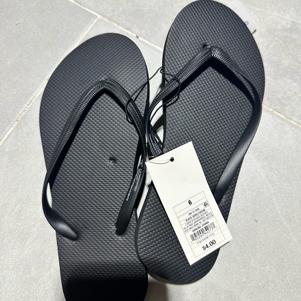 Size 6 Black Flip Flops